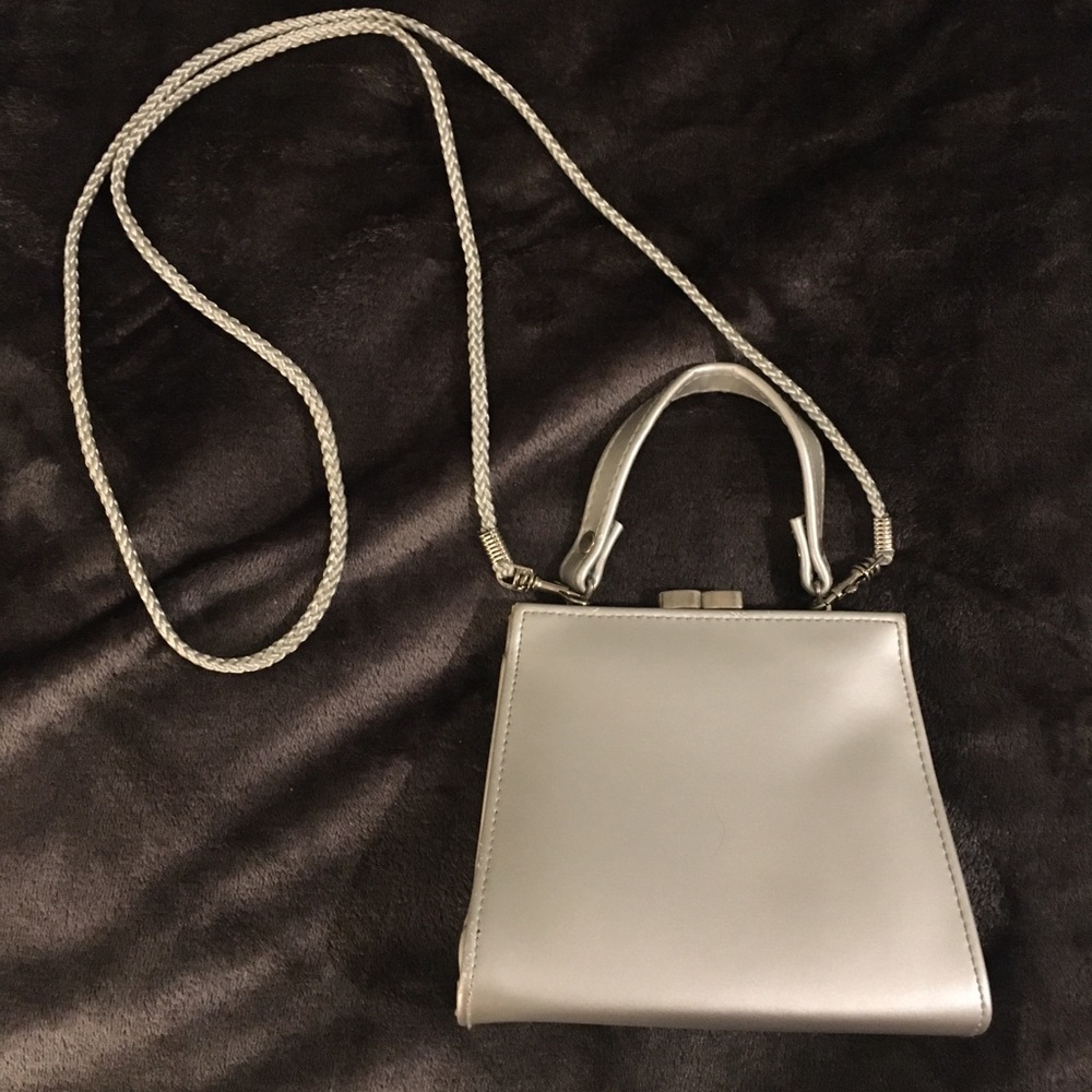 Claire’s clutch silver purse with optional strap